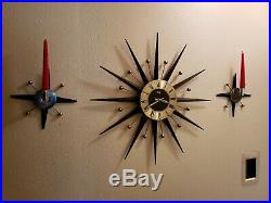 Antique Welby Starburst clock with matching candle holders