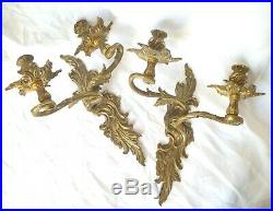 Pair of antique French solid bronze rococo wall sconces, acanthus foliage arms