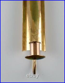 Pierre Forsell for Skultuna. Reflex wall candlestick in brass. 1960s