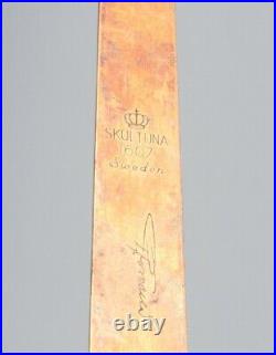 Skultuna, Sweden, a pair of brass candlesticks for wall hanging