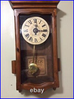 Vintage New England Co. 8 Day Wall Clock With Pendulum, Candle Holders Very Nice