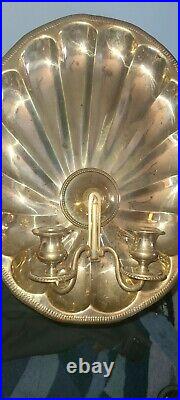Vintage brass shell double candle arm wall sconce